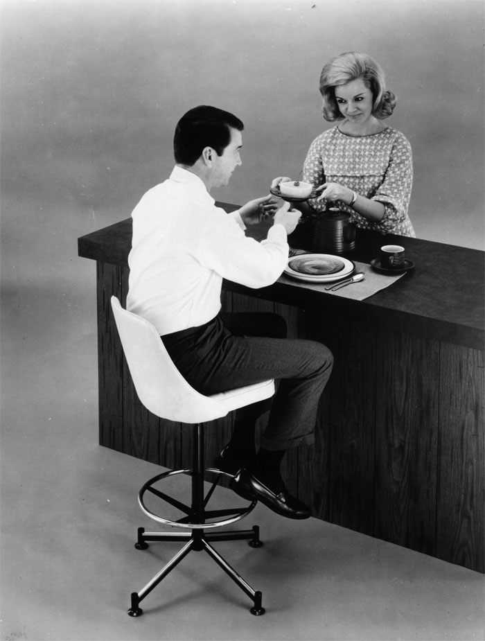 It's about the stool, not the suspicious looks over a grapefruit. - Shopping Hints #105, Item #2, Adjustable Stool. Product News, 4/21/1967. [Medical World News Collection, McGovern Historical Center, IC077, Folder 94.38]