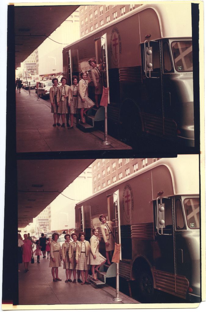 Mobile Unit and crew for the San Jacinto Lung Association, c. 1960s. It's parked in downtown Houston, possibly in front of Foley's Department Store. [San Jacinto Lung Association records, Box 5, P-813, McGovern Historical Center, Texas Medical Center Library.]