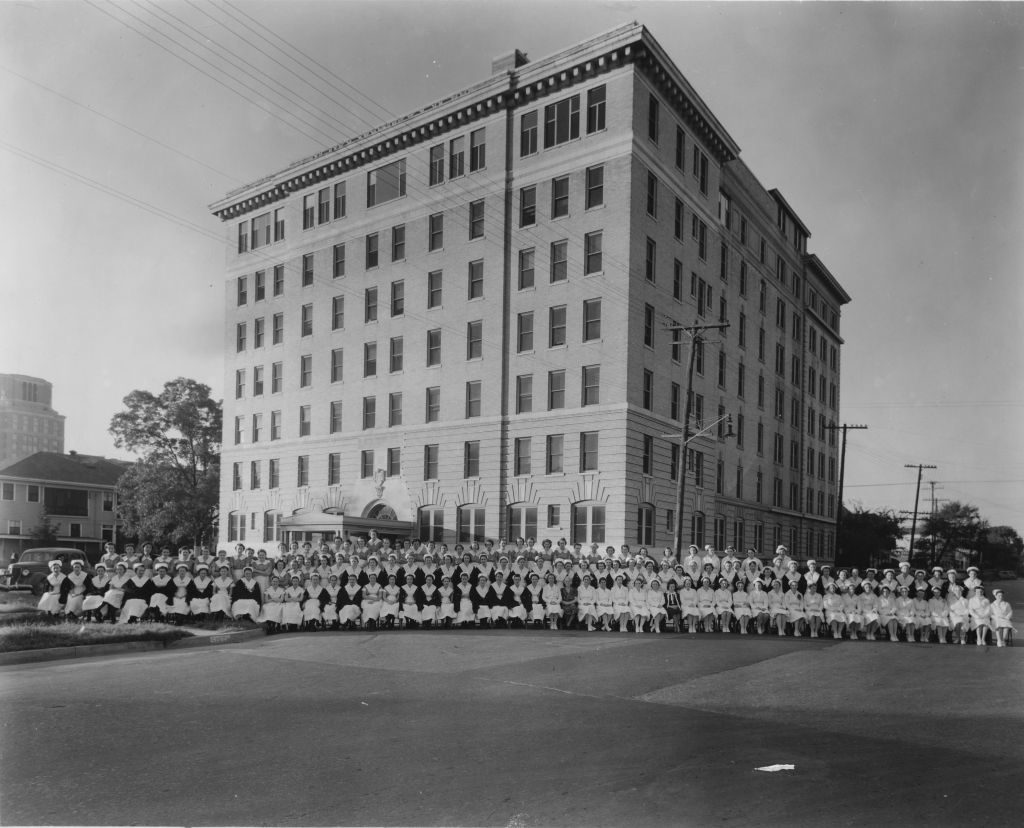 Nursing students and faculty in front of Memorial Hospital, 1940s. Memorial Hospital was located at Lamar and Smith in Downtown Houston. [Memorial Hospital System records, McGovern Historical Center, Texas Medical Center Library, IC 022, IC022-1909-1970sPhotos-03-002]