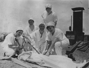 Nursing students "practice" surgery on the roof of the Baptist Sanitarium, 1918. [Memorial Hospital System records, McGovern Historical Center, Texas Medical Center Library, IC 022, IC022-WWIAlbum-01-003d]