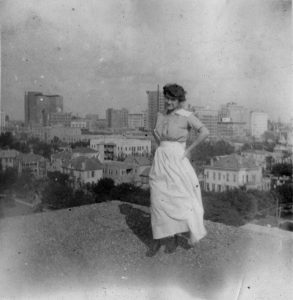 Nursing student on the roof of the Baptist Sanitarium and Hospital (later Memorial Hospital), 1918. [Memorial Hospital System records, McGovern Historical Center, Texas Medical Center Library, IC 022, IC022-WWIAlbum-03-005d]