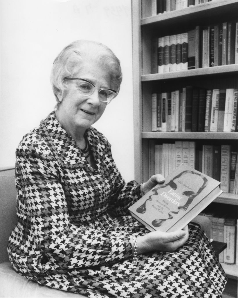 Portrait of Hilde Bruch with her book Eating Disorders. [McGovern Historical Center, MS 007 Hilde Bruch, MD papers, MS007-P3706-001]