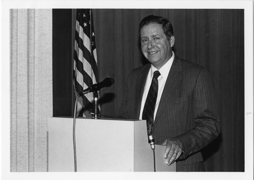 Image of Dr. Richard E. Wainerdi at lectern. [McGovern Historical Center, IC 002 Texas Medical Center records, Box 56]