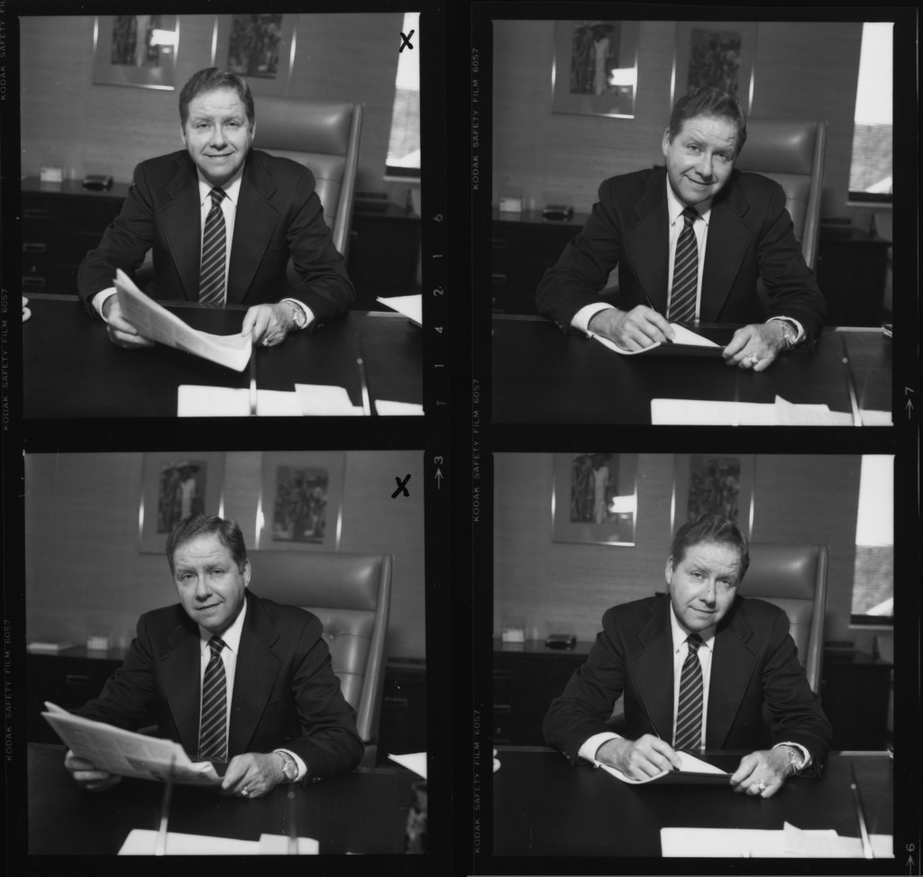 Detail of contact sheet featuring frames of Dr. Richard E. Wainerdi in his office. [McGovern Historical Center, IC 002 Texas Medical Center records, Box 56]