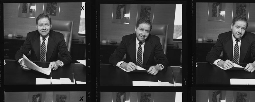 Collage of contact sheet frames featuring Dr. Richard E. Wainerdi in his office. [McGovern Historical Center, IC 002 Texas Medical Center records, Box 56]