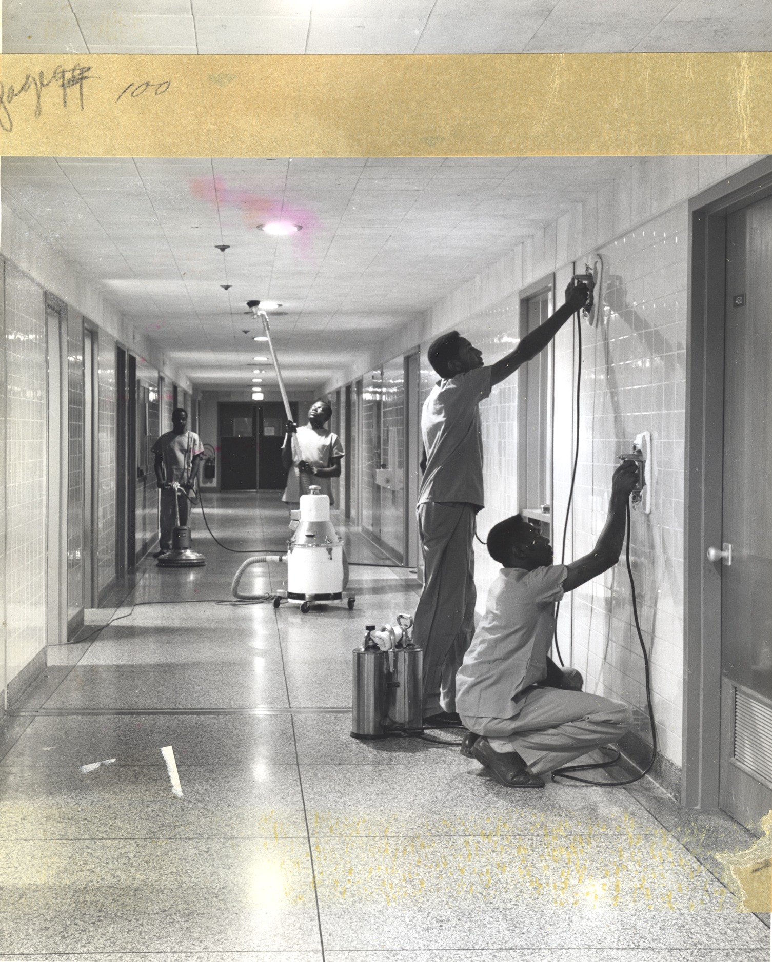 Cleaning the halls, circa 1950s (MS070 Series VIII, Box 188, folder 3)