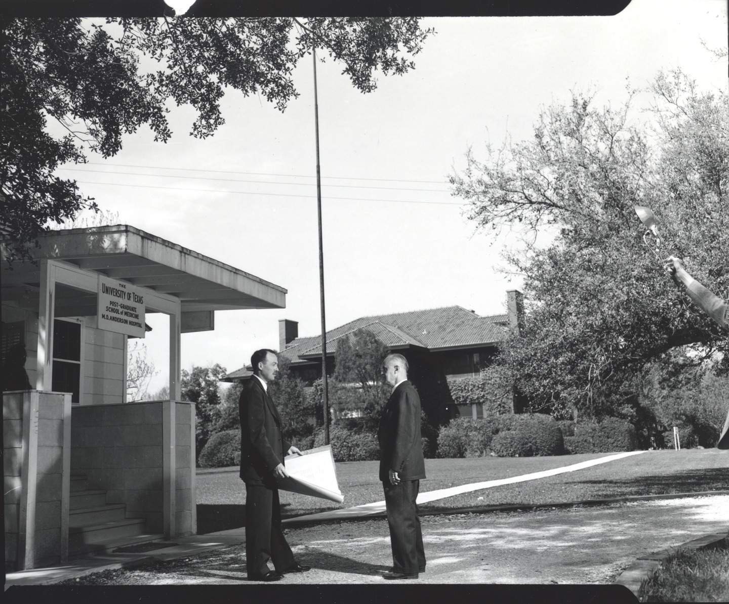 Clark and someone else on the grounds of the Baker Estate, circa 1949 (MS070 Series VIII, Box 58, folder 1)