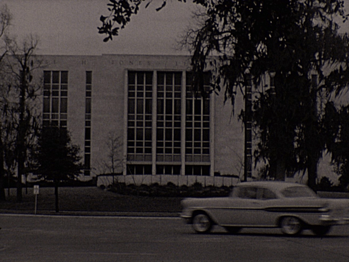 Jesse Jones Library building, Home of The TMC Library (HD). [Screenshot from "Help Wanted" (1958), AVF.MS238.001, MS 238 Films on Mental Health provided by Bill Schnapp, McGovern Historical Center, Texas Medical Center Library]