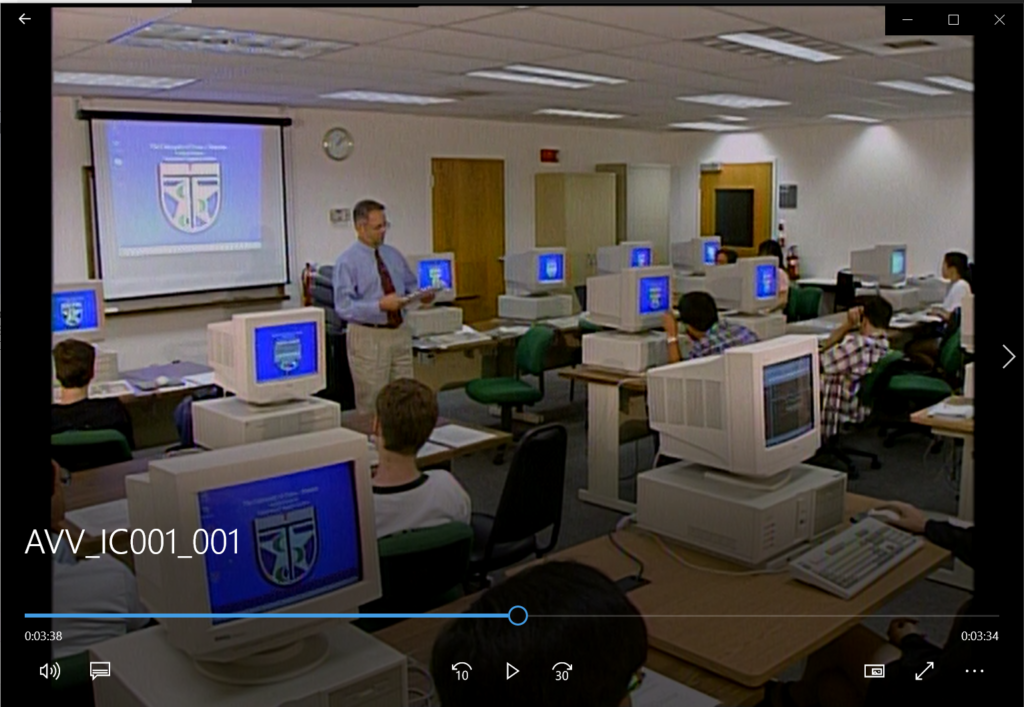 [Screenshot from “The Houston Academy of Medicine - Texas Medical Center Library Meeting the Challenge” (1997). Damon Camille, Public Affairs Services, teaches people to access information online via the TMC Library. AVV-IC001-001, IC 001 Houston Academy of Medicine-Texas Medical Center Library records, McGovern Historical Center, TMC Library]