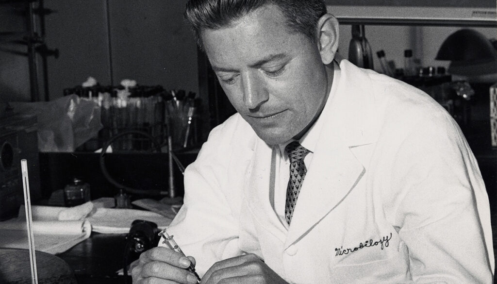 [Dr. McGovern conducting research at Baylor College of Medicine in 1959. MS 115 John P. McGovern, MD Papers, scrapbook box, folder 16, McGovern Historical Center, Texas Medical Center Library.]