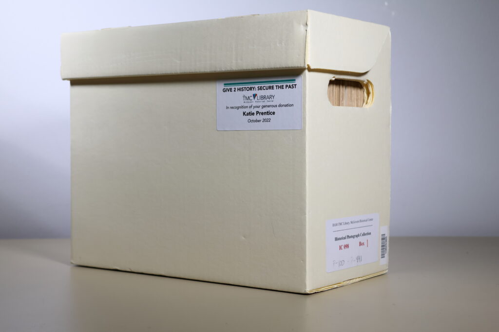 Image of an adopted box from October 2022. Shows the name of donor permanently labels on the box "In recognition of your generous donation." The box is located in IC 098 Historical Photograph Collection, Box 1.