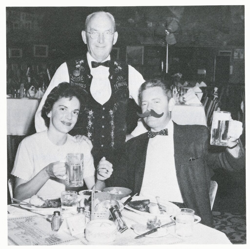 Honeymooners Kathy and John dining at the Old Heidelberg restaurant in North Hollywood, Florida, 1961. (MS 115 Dr. John P. McGovern Papers, Box 3 Folder 5)