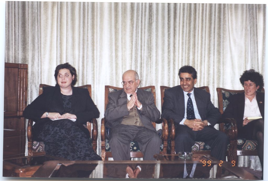 Debbie Goldberg, Executive Director of Texas Hadassah Medical Research Foundation, with others in the Israeli and Palestinian delegation during the press conference inside Yasser Arafat International Airport in Gaza on February 9, 1999. [IC 105 Texas Hadassah Medical Research Foundation records, McGovern Historical Center, TMC Library, IC105-029]