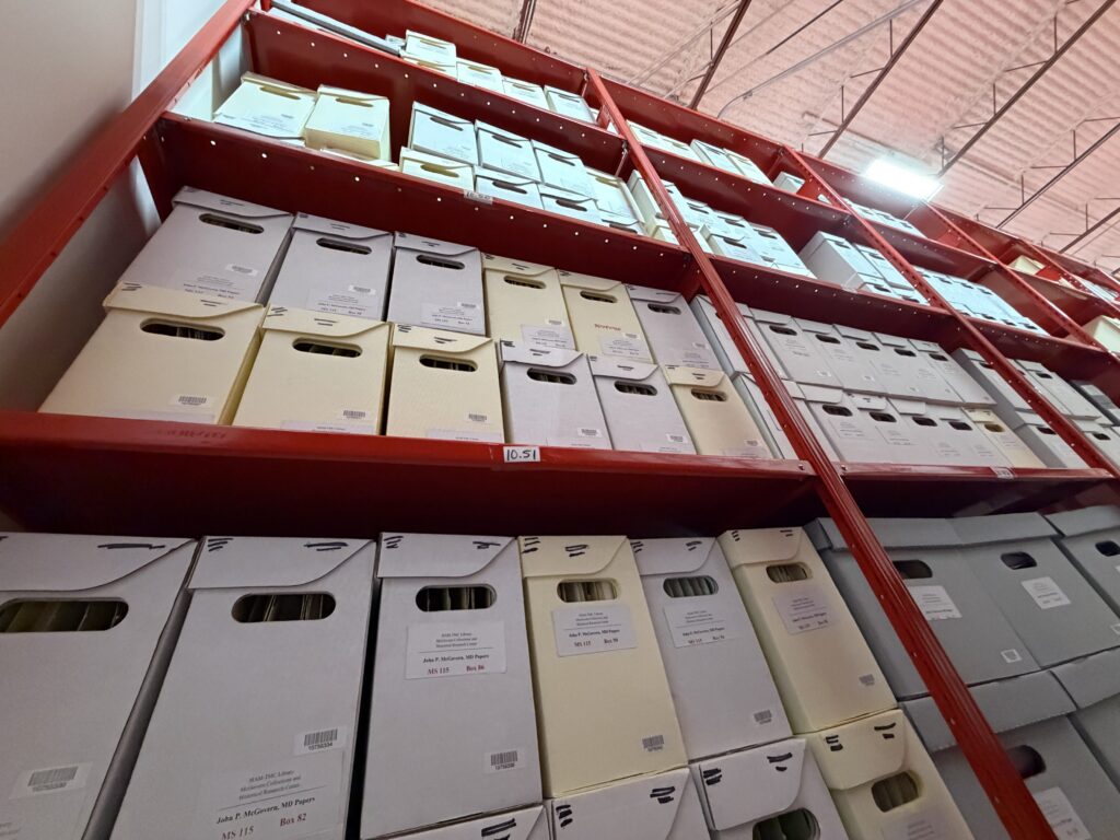 Photograph of a portion of MS 115 as a fully processed collection open for research at the McGovern Historical Center archives.
